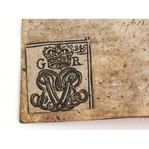 638A - A George II 1751 legal document fragment with wax seal, 36cm wide.