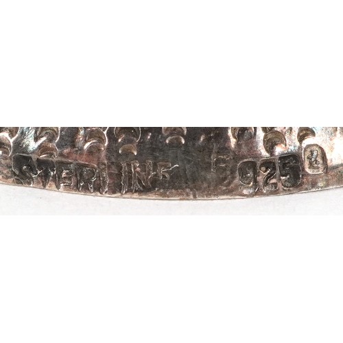 2523 - Three silver open salts cast as Putti riding dolphins, with shell design bowls, the largest 15cm hig... 
