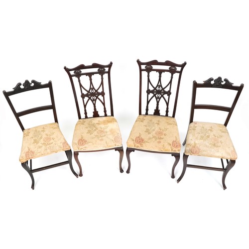 1007 - An Edwardian mahogany four piece salon suite, with carved and pierced backs, raised on cabriole legs... 