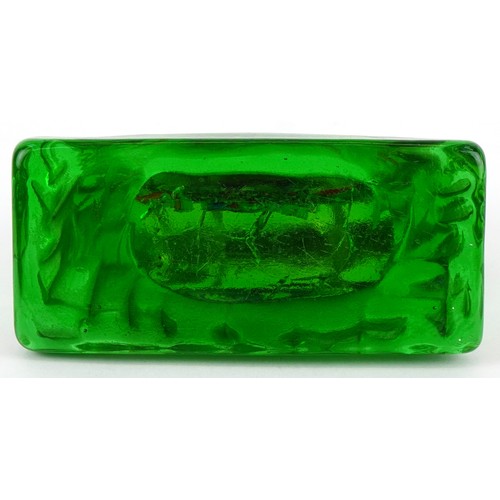 77 - A Murano glass aquarium sculpture internally painted with a fish amongst reeds, 14cm high.