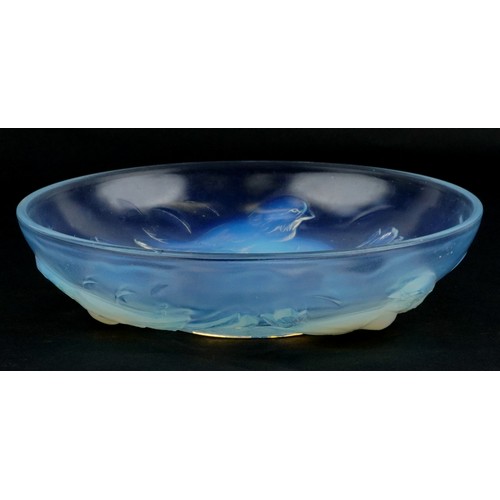  An Ezan France opalescent pressed glass bowl decorated with birds, 25cm in diameter.