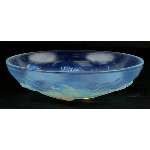  An Ezan France opalescent pressed glass bowl decorated with birds, 25cm in diameter.