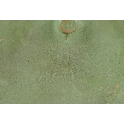 41 - An ecclesiastical verdigris patinated bronze plaque depicting Christ, 9.5cm high.