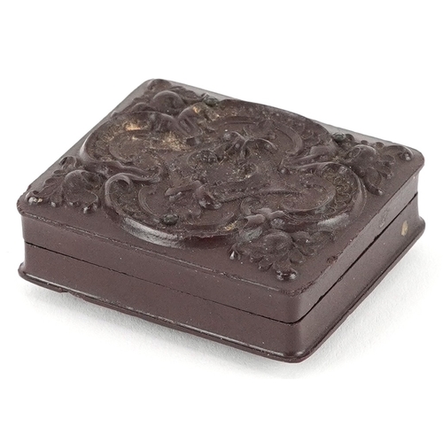 107 - A Victorian thermo-plastic daguerreotype photograph case, 5cm high.