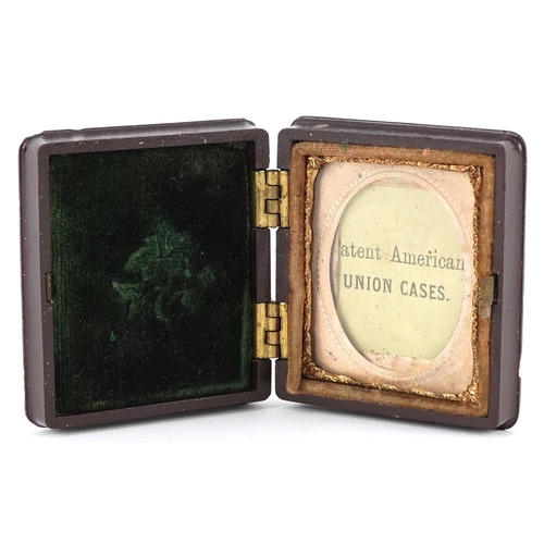 107 - A Victorian thermo-plastic daguerreotype photograph case, 5cm high.