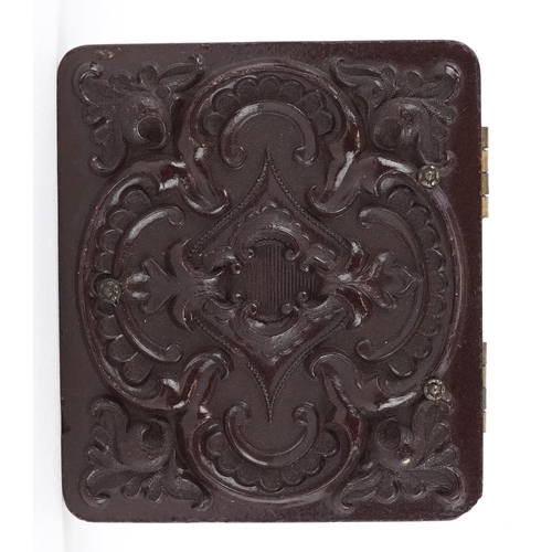 107 - A Victorian thermo-plastic daguerreotype photograph case, 5cm high.