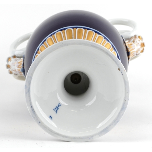  Ernst August Leuteritz for Meissen, a large 19th century German porcelain vase with snake handles an... 
