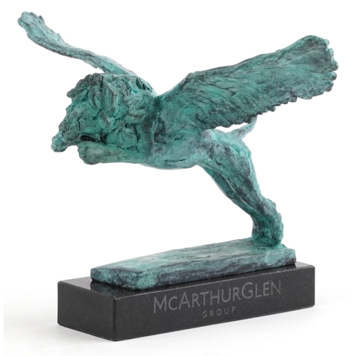 42 - Mark Coreth for McArthur Glen Group, a verdigris bronze figure of a winged lion raised on a black sl... 