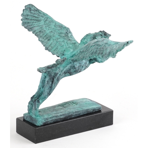 42 - Mark Coreth for McArthur Glen Group, a verdigris bronze figure of a winged lion raised on a black sl... 