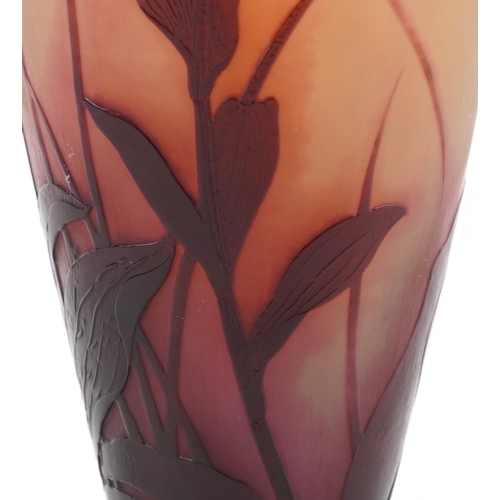 9 - Émile Gallé, a tall cameo glass vase overlaid with stylized flowers, 46cm high.