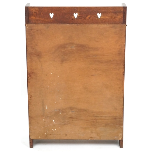  Liberty's Arts & Crafts oak student's bureau with chequer stringing and pierced decoration, the fall... 