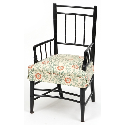  E W Godwin Arts & Crafts ebonised spindle back elbow chair, 90cm high x 53cm x 47cm D.