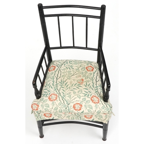  E W Godwin Arts & Crafts ebonised spindle back elbow chair, 90cm high x 53cm x 47cm D.