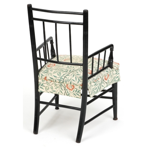 E W Godwin Arts & Crafts ebonised spindle back elbow chair, 90cm high x 53cm x 47cm D.