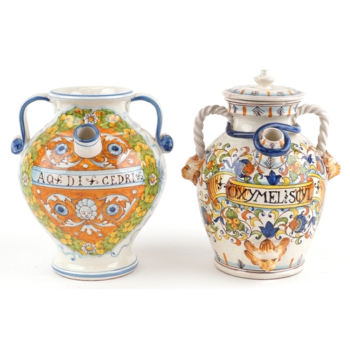 18 - Two Majolica apothecary jars, the largest 26cm high.