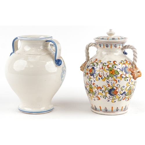 18 - Two Majolica apothecary jars, the largest 26cm high.
