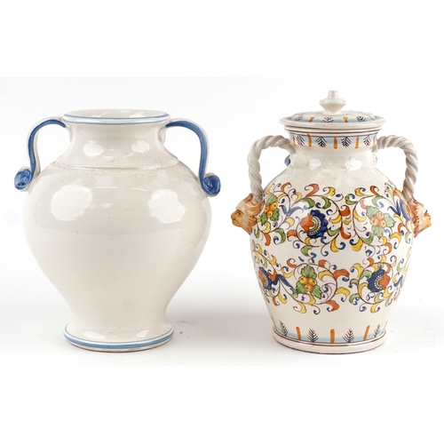 18 - Two Majolica apothecary jars, the largest 26cm high.