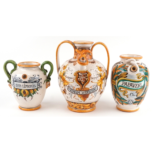 20 - Three Majolica apothecary jars, the largest 38cm high.