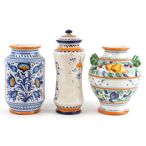 21 - Three Majolica apothecary jars, the largest 38cm high.