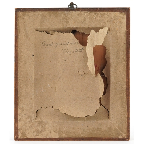 45 - A Georgian hand painted silhouette of a young female, within in a maple frame, 11cm x 9cm.