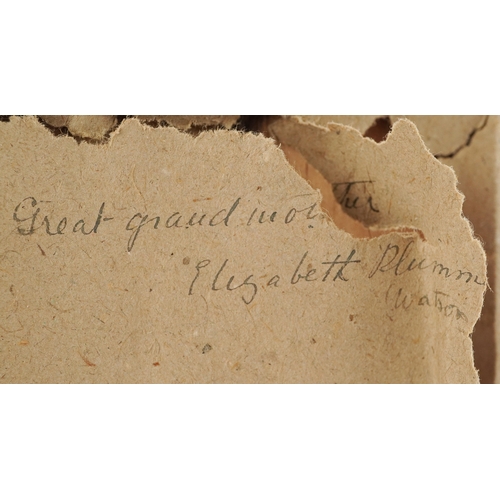 45 - A Georgian hand painted silhouette of a young female, within in a maple frame, 11cm x 9cm.