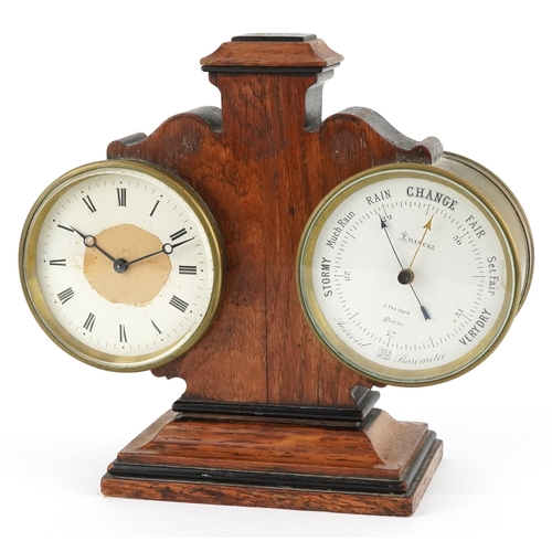 An early 20th century oak desk clock/aneroid barometer, the dial inscribed Emanuel 3 The Hard Portsea, 19cm high.