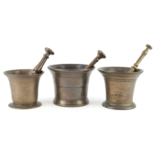  17th century and later bronze pestles and mortars, the largest pestle 21cm in length.