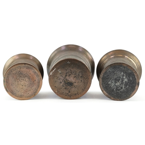  17th century and later bronze pestles and mortars, the largest pestle 21cm in length.