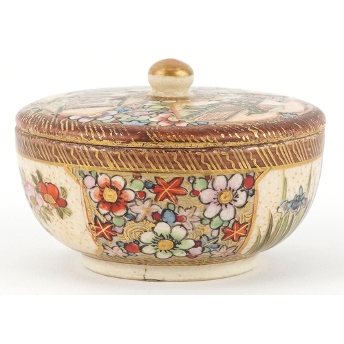 54 - A Japanese Satsuma earthenware pot and cover finely hand painted with figures and flowers, character... 