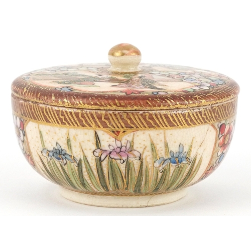 54 - A Japanese Satsuma earthenware pot and cover finely hand painted with figures and flowers, character... 