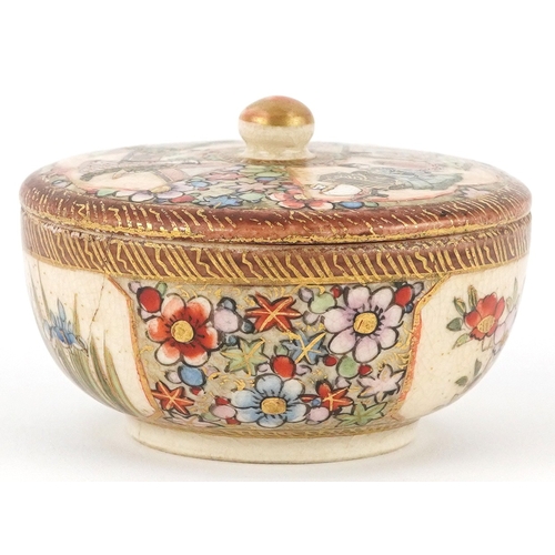 54 - A Japanese Satsuma earthenware pot and cover finely hand painted with figures and flowers, character... 