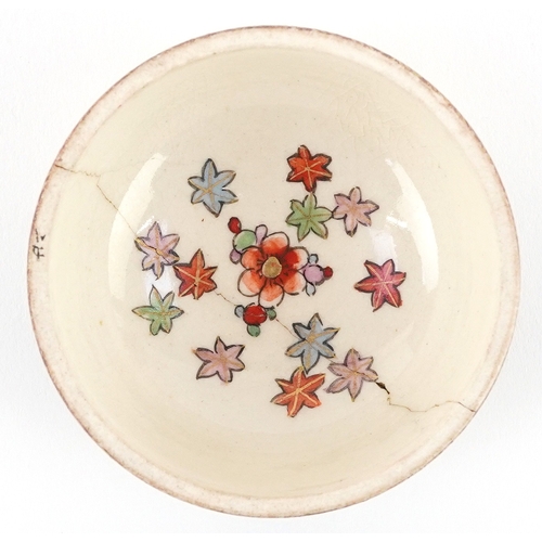 54 - A Japanese Satsuma earthenware pot and cover finely hand painted with figures and flowers, character... 