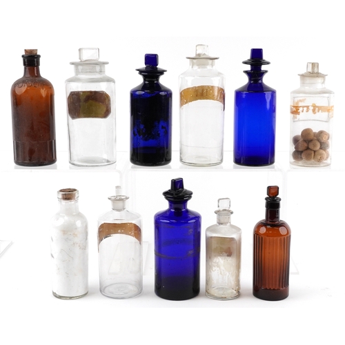 82 - A collection of early 20th century and later apothecary/pharmaceutical glass jars with stoppers, the... 