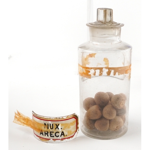 82 - A collection of early 20th century and later apothecary/pharmaceutical glass jars with stoppers, the... 