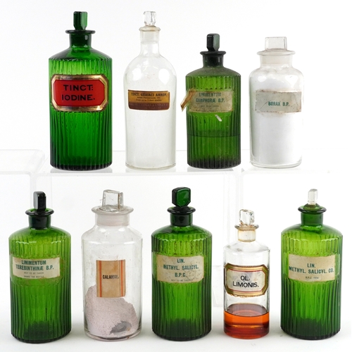81 - A collection of early 20th century apothecary/pharmaceutical glass bottles with stoppers, the larges... 