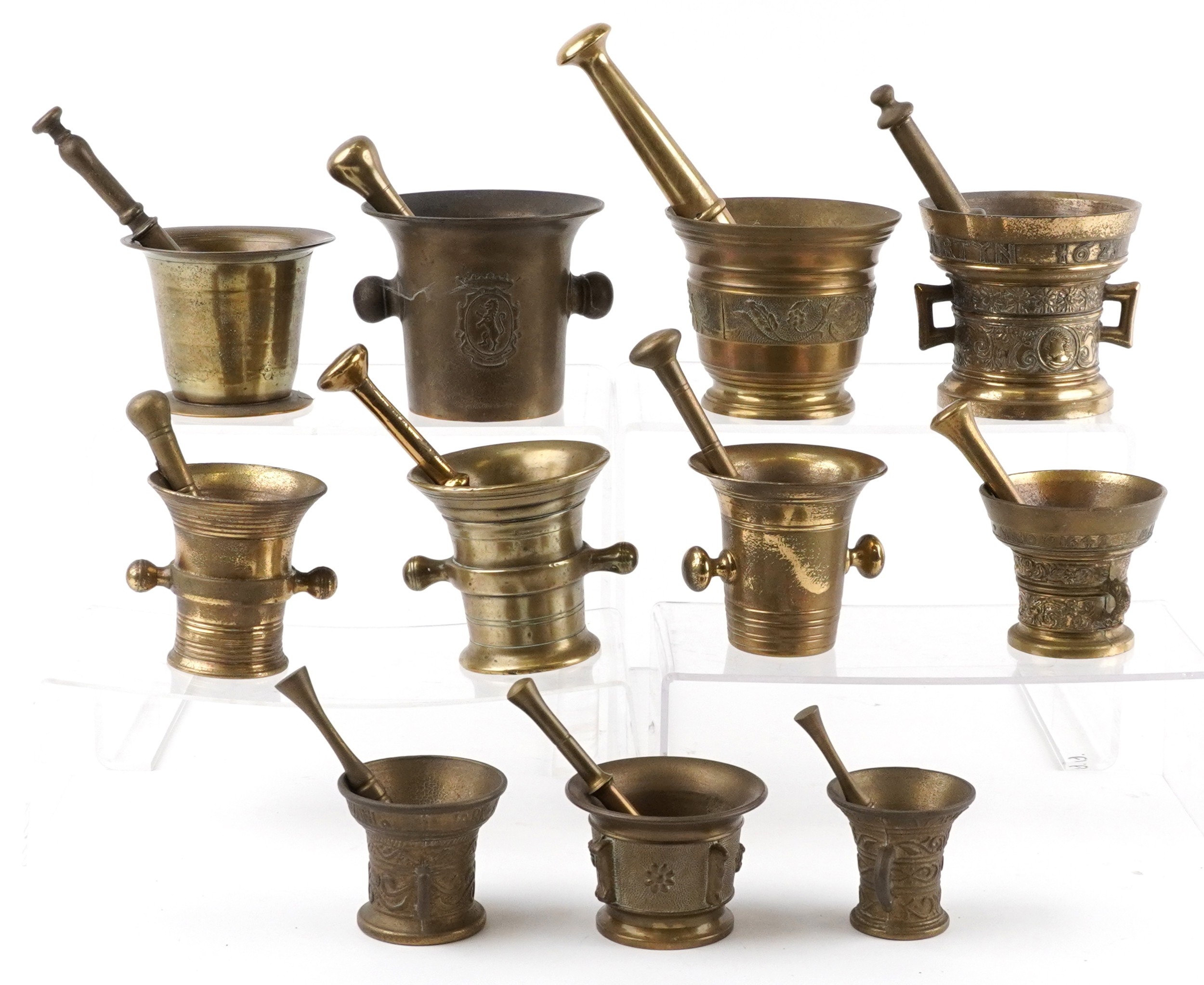 Antique and later bronze and brass pestles and mortars, including 17th ...