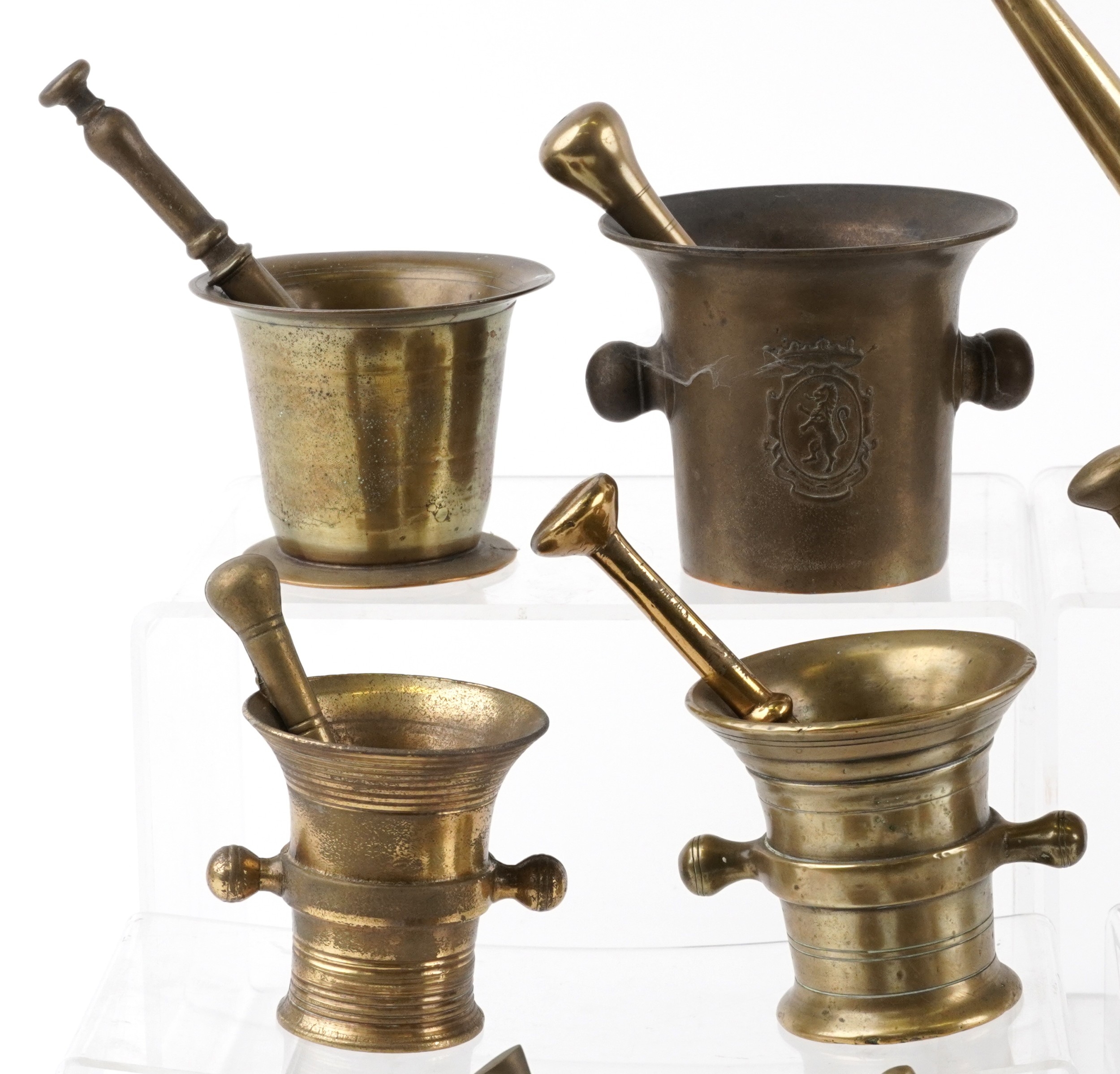 Antique and later bronze and brass pestles and mortars, including 17th ...