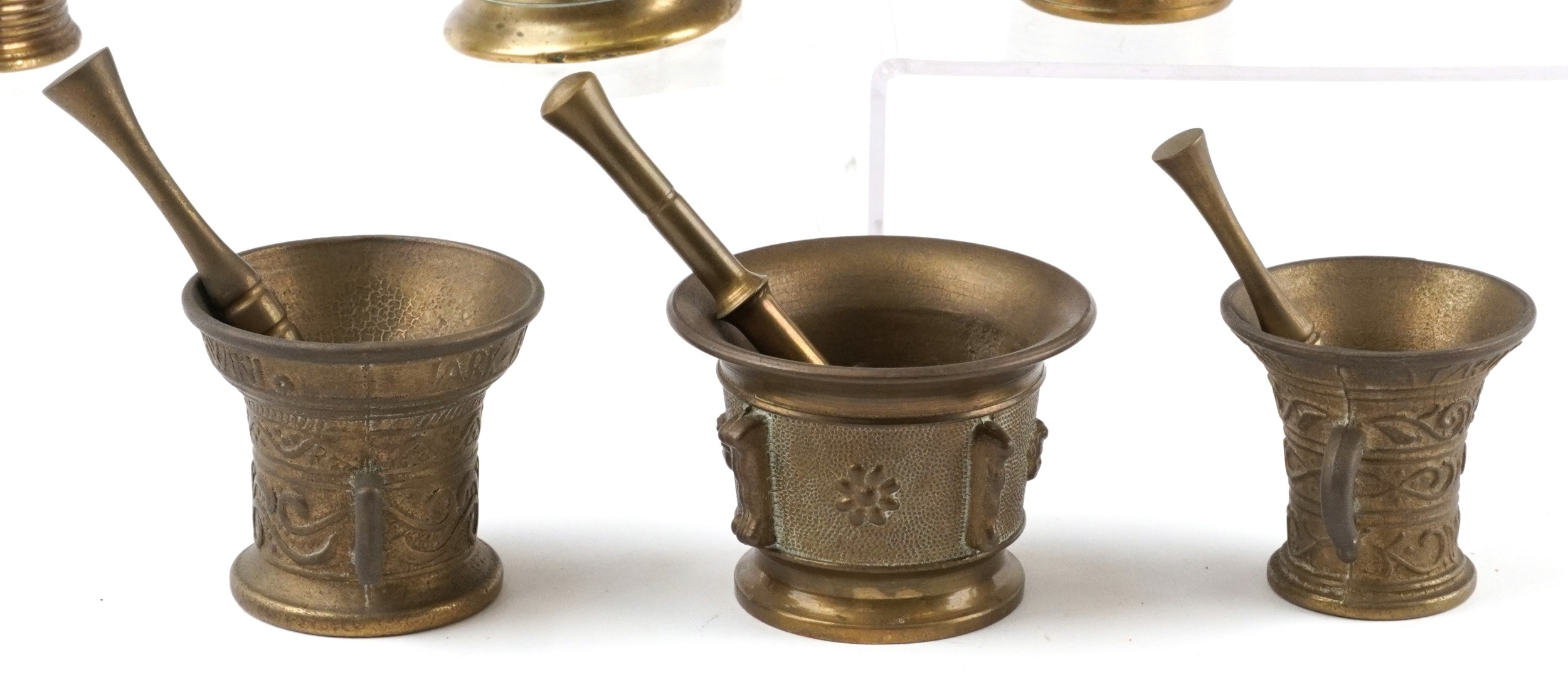 Antique and later bronze and brass pestles and mortars, including 17th ...