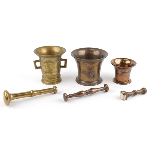  17th century and later bronze pestles and mortars, the largest pestle 20cm in length.