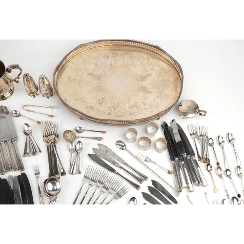 A large collection of silver plated cutlery and objects including ...