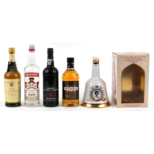 Five bottles of alcohol including Fine Calvados, Bell's Scotch whisky ...