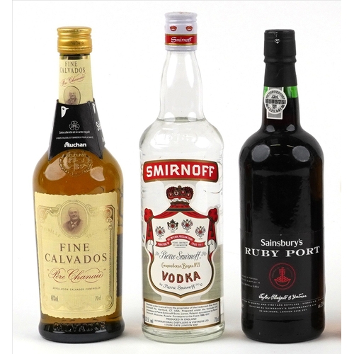 Five bottles of alcohol including Fine Calvados, Bell's Scotch whisky ...