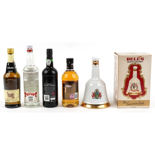 Five bottles of alcohol including Fine Calvados, Bell's Scotch whisky ...