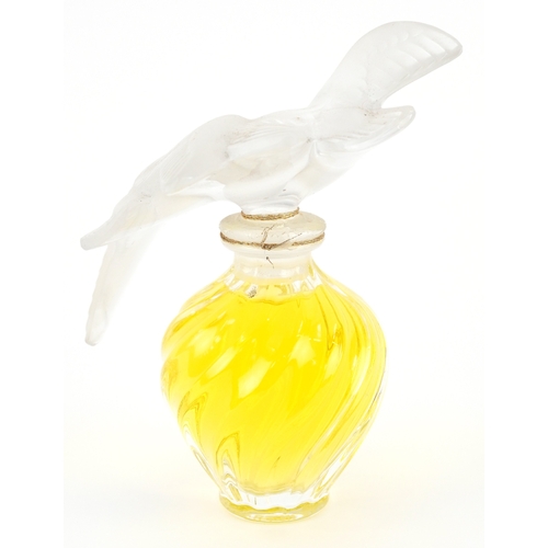 2 - Lalique for Nina Ricci, a signed moulded glass scent bottle with contents, etched Lalique France to ... 
