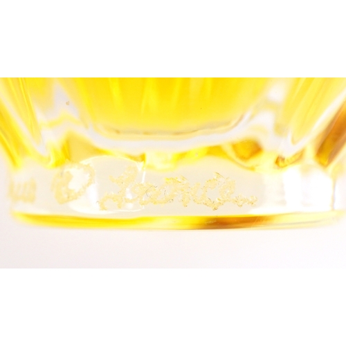 2 - Lalique for Nina Ricci, a signed moulded glass scent bottle with contents, etched Lalique France to ... 
