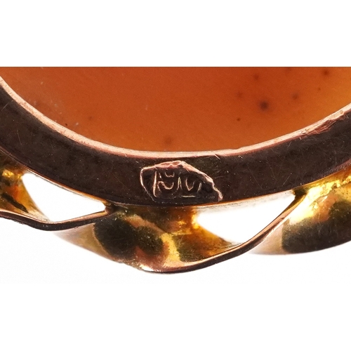  A 9ct gold mounted cameo brooch carved with the goddess Nyx, 3.4cm high, 7.6g.