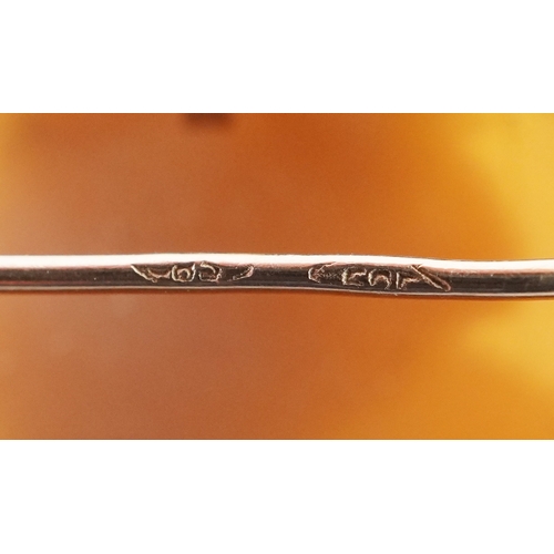  A 9ct gold mounted cameo shell pendant brooch carved with a female in Elizabethan dress, 2.7cm in di... 