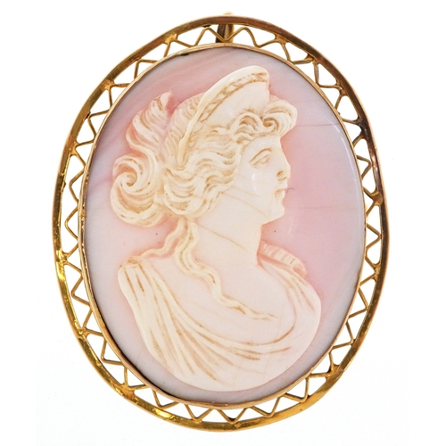 An antique unmarked high carat gold mounted angel skin cameo brooch carved with a maiden, 4.6cm high... 