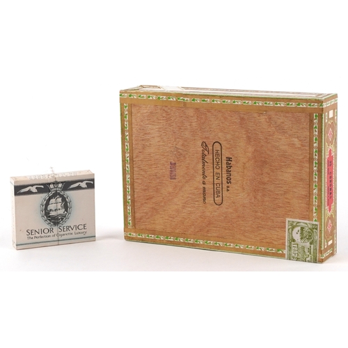 102 - Twelve Saint Luis Rey Habana cigars with box and a sealed packet of Senior Service cigarettes.