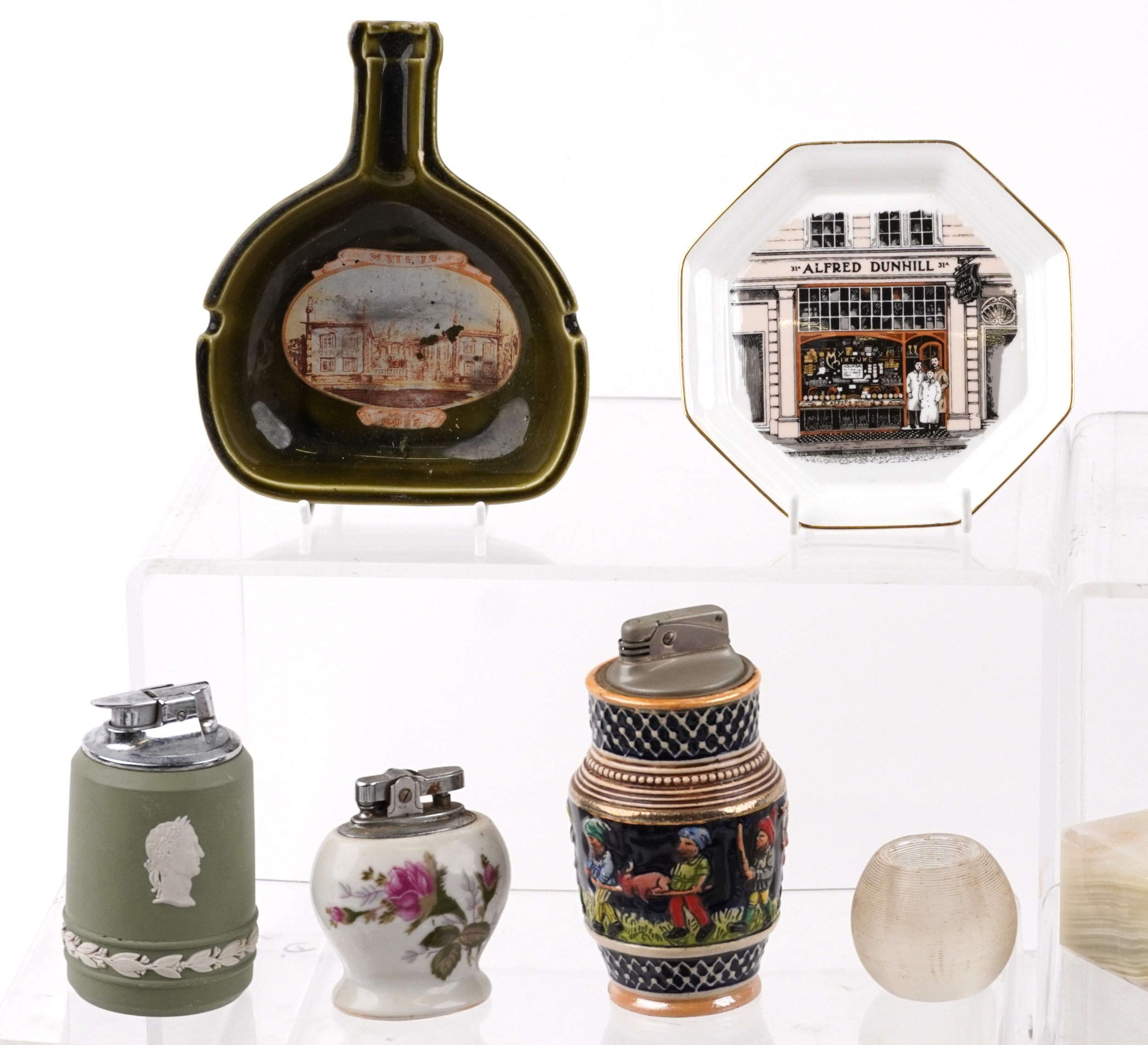 Smoking objects, some advertising, including glass ashtrays, onyx table ...